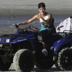 File photo of pop star Justin Bieber driving an all-terrain vehicle at a resort in Punta Chame on outskirts of Panama City