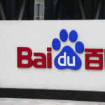 A man walks past the logo of Baidu at its headquarter in Beijing on July 22, 2010. Chinese Internet search giant Baidu said its profits more than doubled in the second quarter, as its customer base widened at the expense of rival Google. AFP PHOTO / LIU Jin (Photo credit should read LIU JIN/AFP/Getty Images)