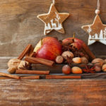 A Christmas arrangement of apples, nuts and stars